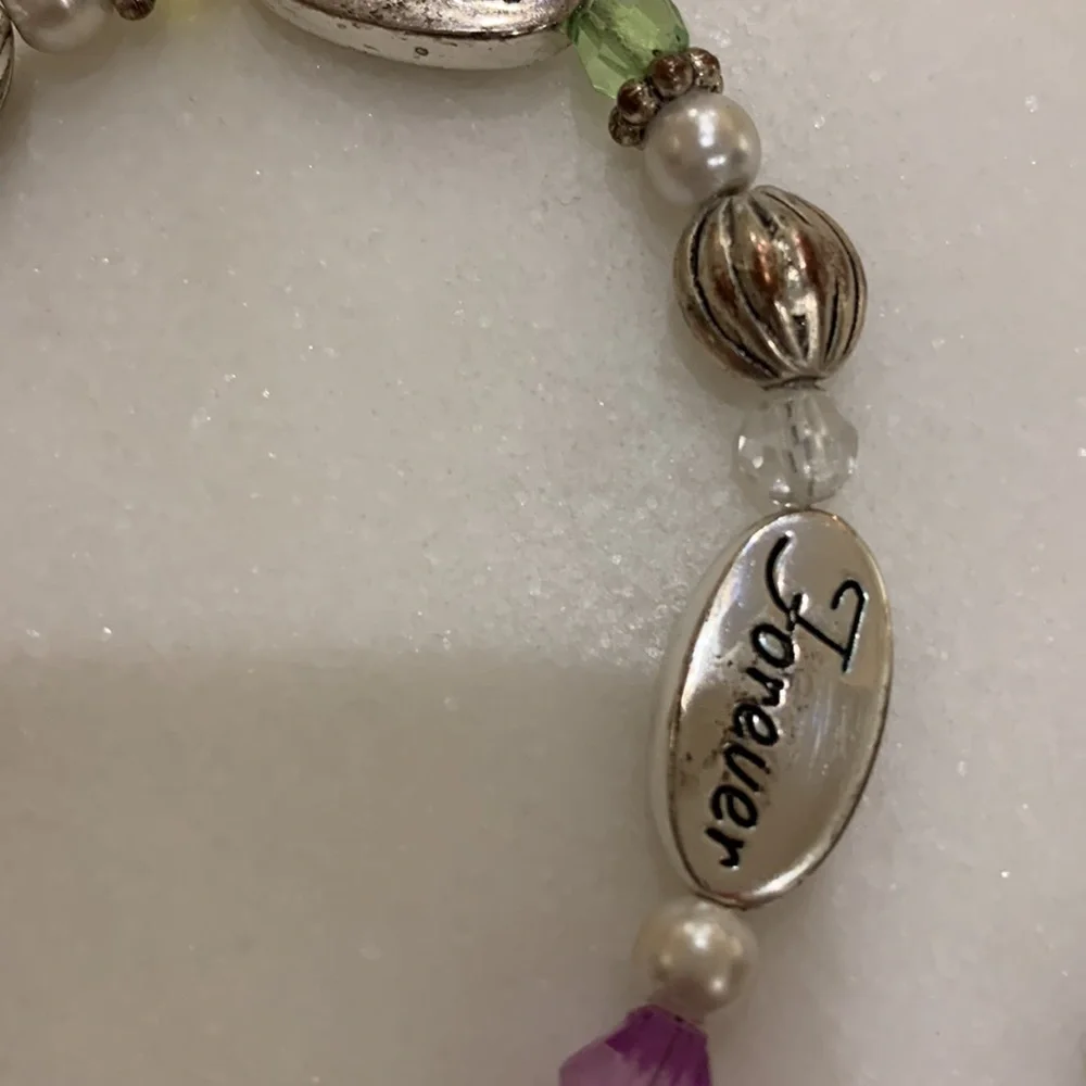 Love,Friend,Forever bracelet‎ plus 2 with orange beads.One is stretch.